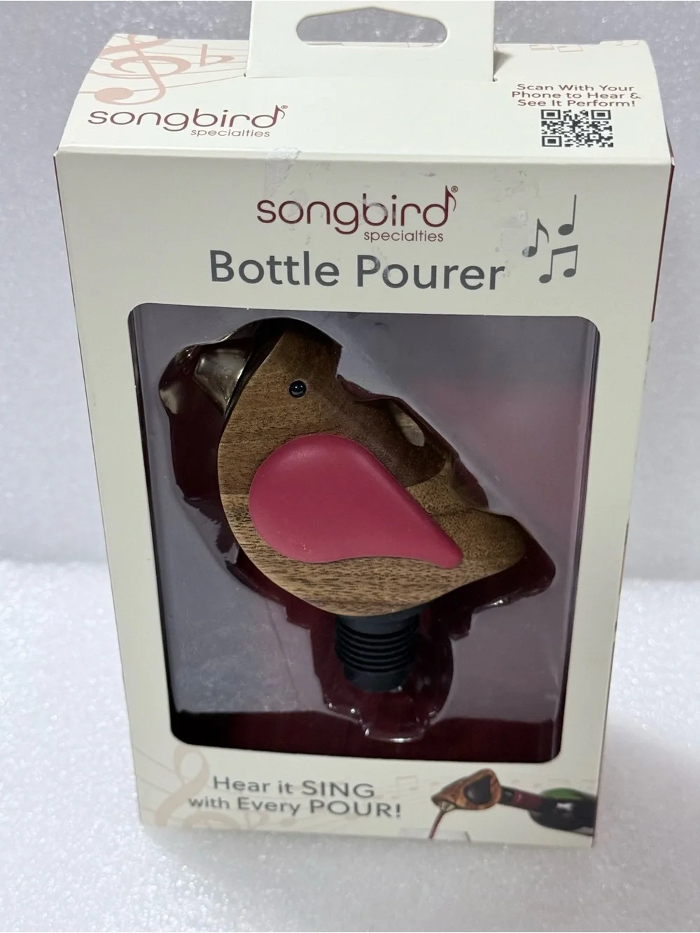 The Songbird Specialties red-winged bird-shaped bottle pourer